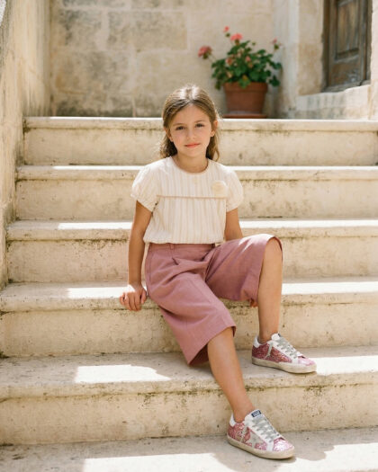 Kız Çocuk Pembe Pileli Arka Bel Lastikli Dizaltı Bermuda Şort